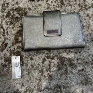 Reaction by Kenneth Cole silver wallet with pink accents